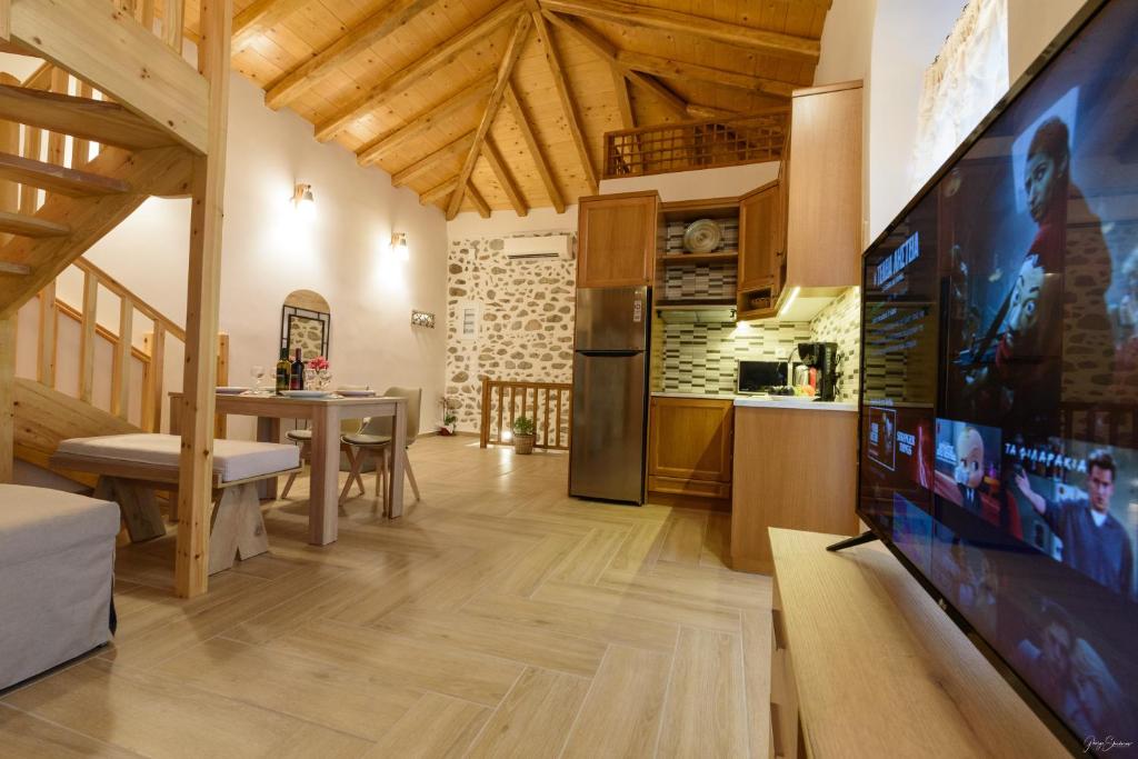 TV a/nebo společenská místnost v ubytování Guarda il porto