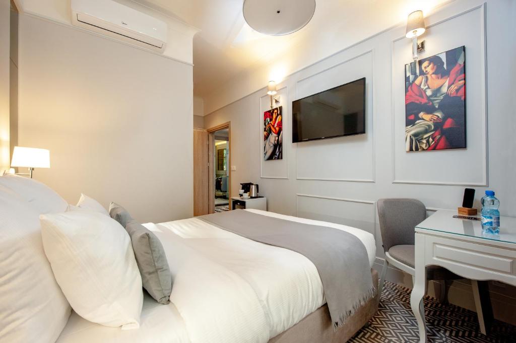 Posteľ alebo postele v izbe v ubytovaní Amber Design Residence