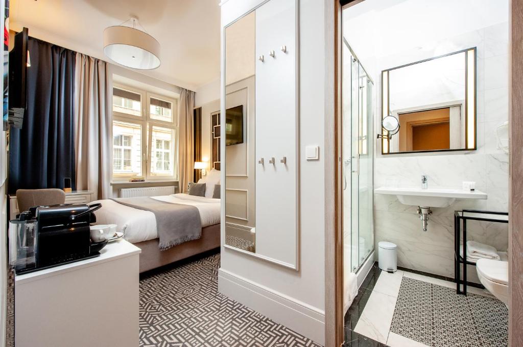 Posteľ alebo postele v izbe v ubytovaní Amber Design Residence