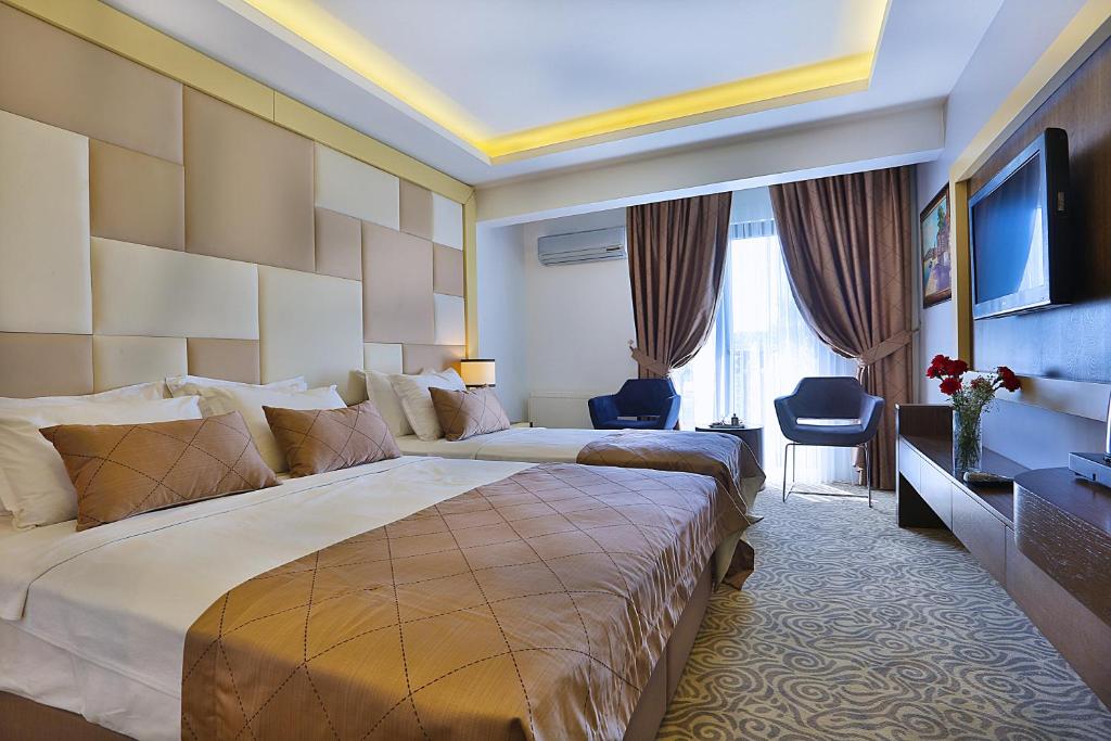 Postel nebo postele na pokoji v ubytování Grand Sagcanlar Hotel