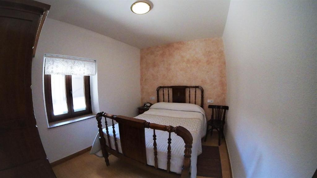 Posteľ alebo postele v izbe v ubytovaní Casa Rural Abuela Tina