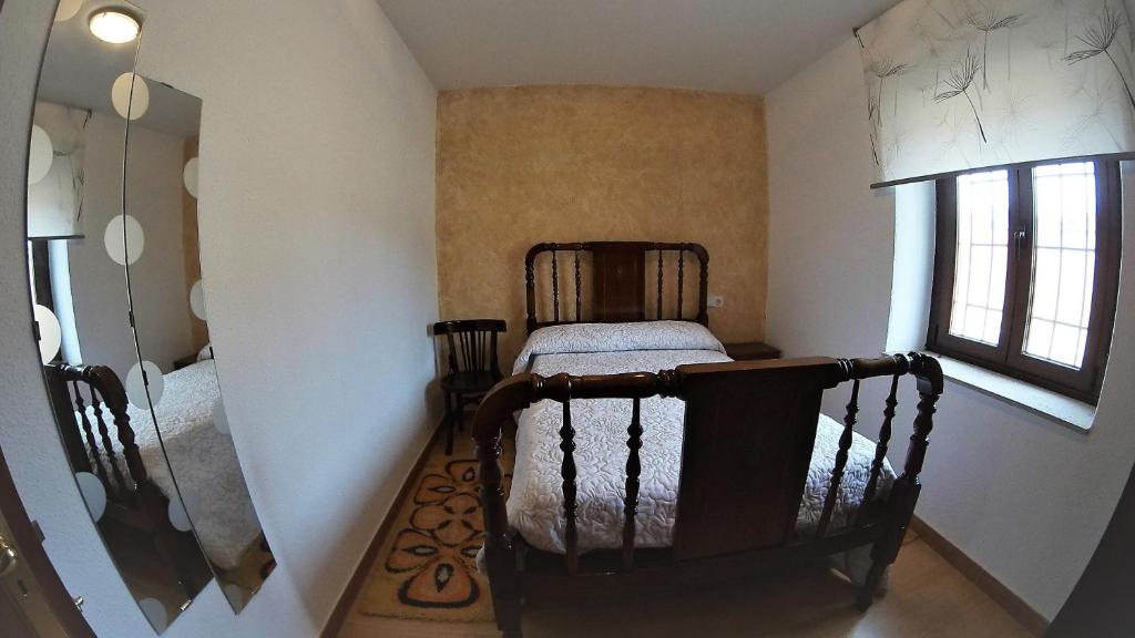 Posteľ alebo postele v izbe v ubytovaní Casa Rural Abuela Tina