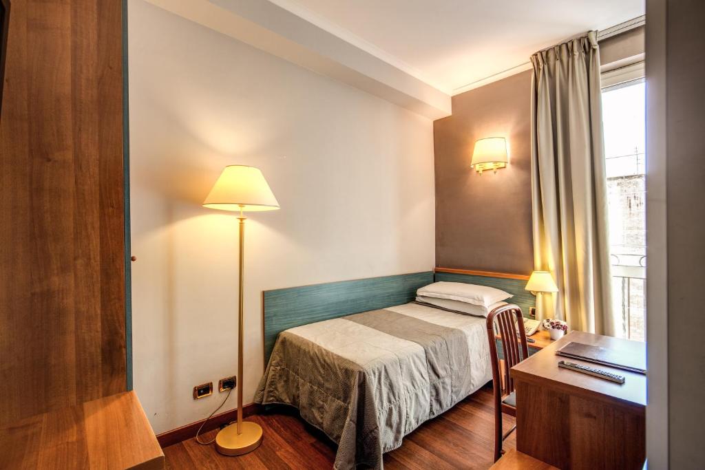 Posteľ alebo postele v izbe v ubytovaní Hotel Villafranca
