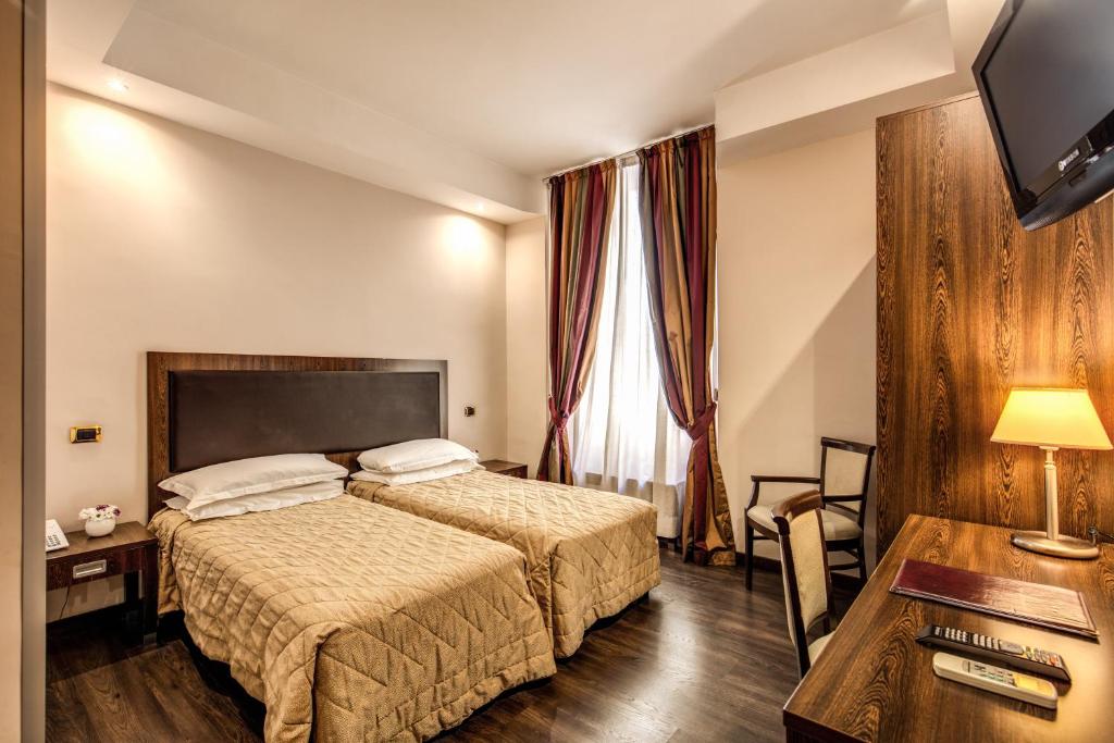 Posteľ alebo postele v izbe v ubytovaní Hotel Villafranca