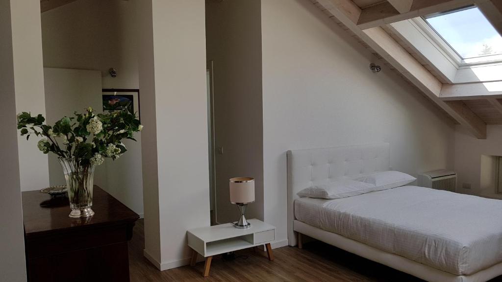 Łóżko lub łóżka w pokoju w obiekcie DE PIANTE GUEST
