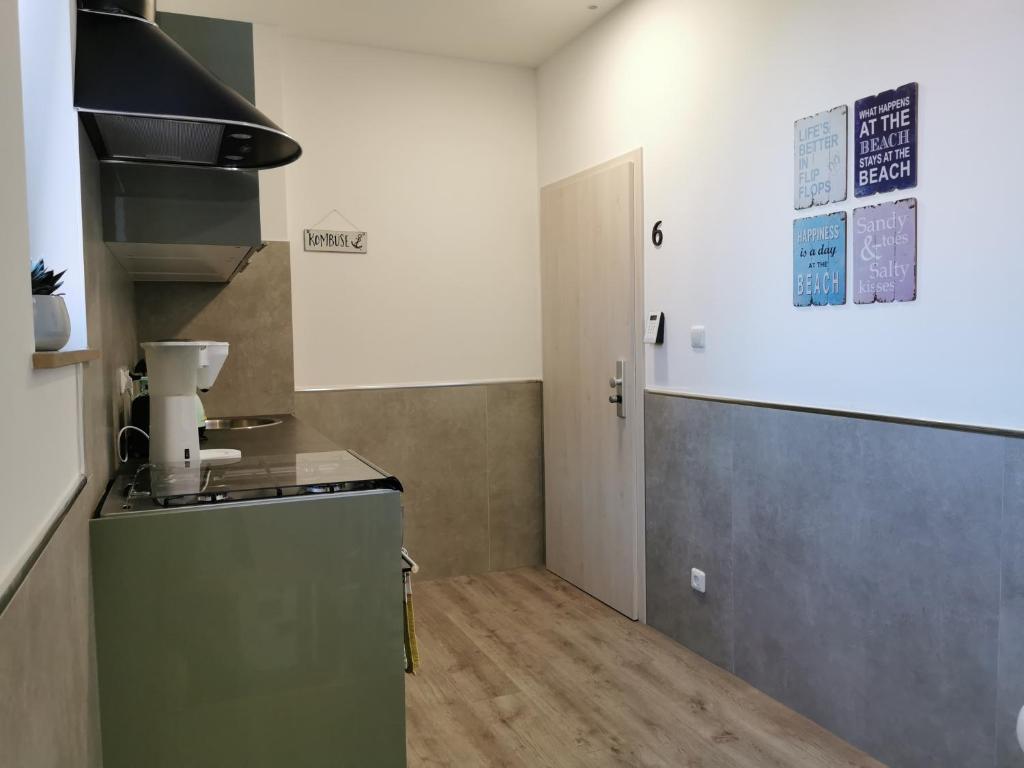 Kuchyň nebo kuchyňský kout v ubytování Gästehaus Twee Linden