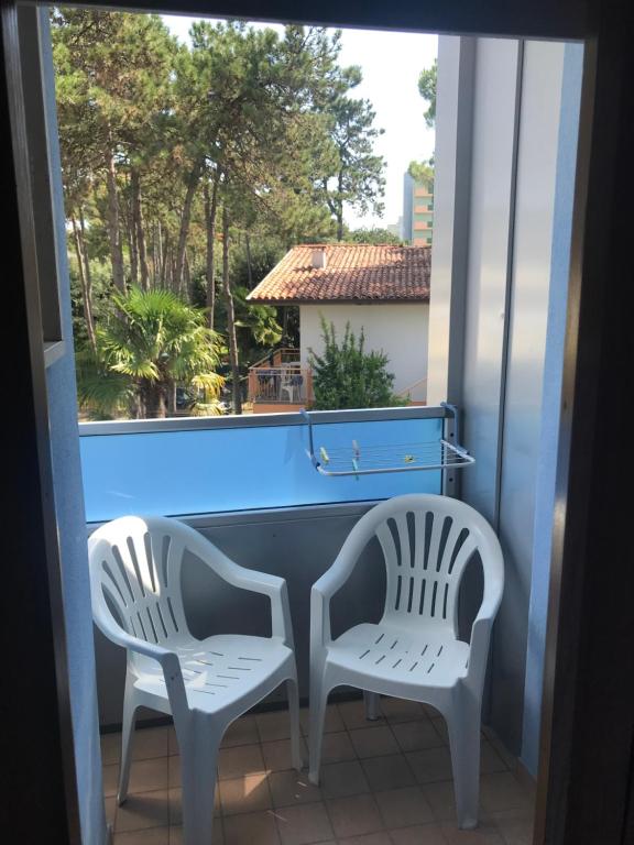 A balcony or terrace at Hotel Alemagna Bed&Breakfast Bibione Lido del Sole