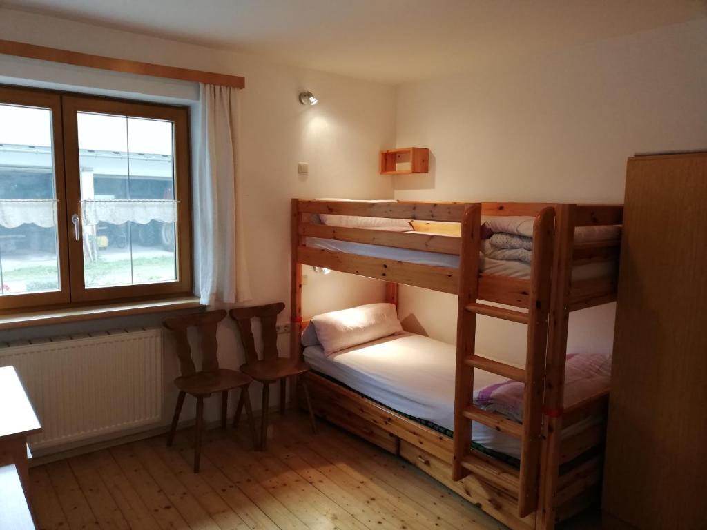 Postel nebo postele na pokoji v ubytování Oberstockinghof