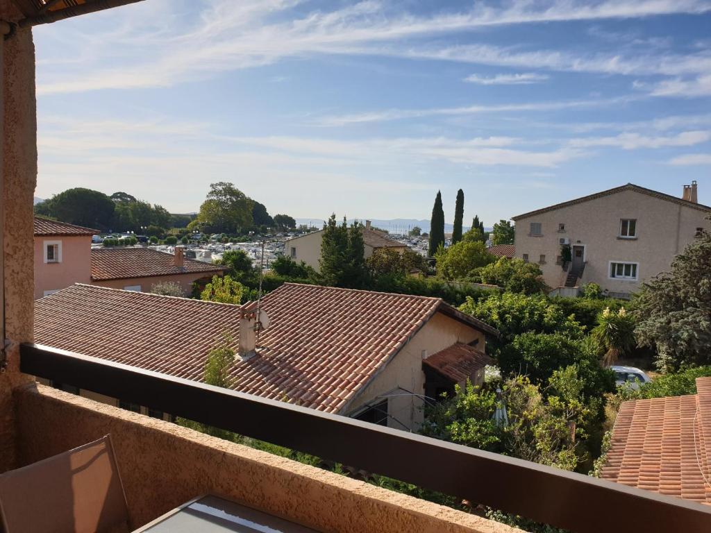 a view from the roof of a house at Studio Mezzanine vue port et mer in La Londe-les-Maures