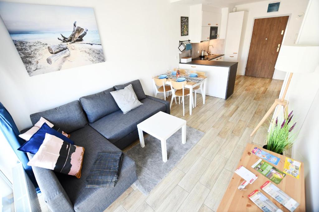 Posedenie v ubytovaní Apartament Lazur z miejscem postojowym w garażu