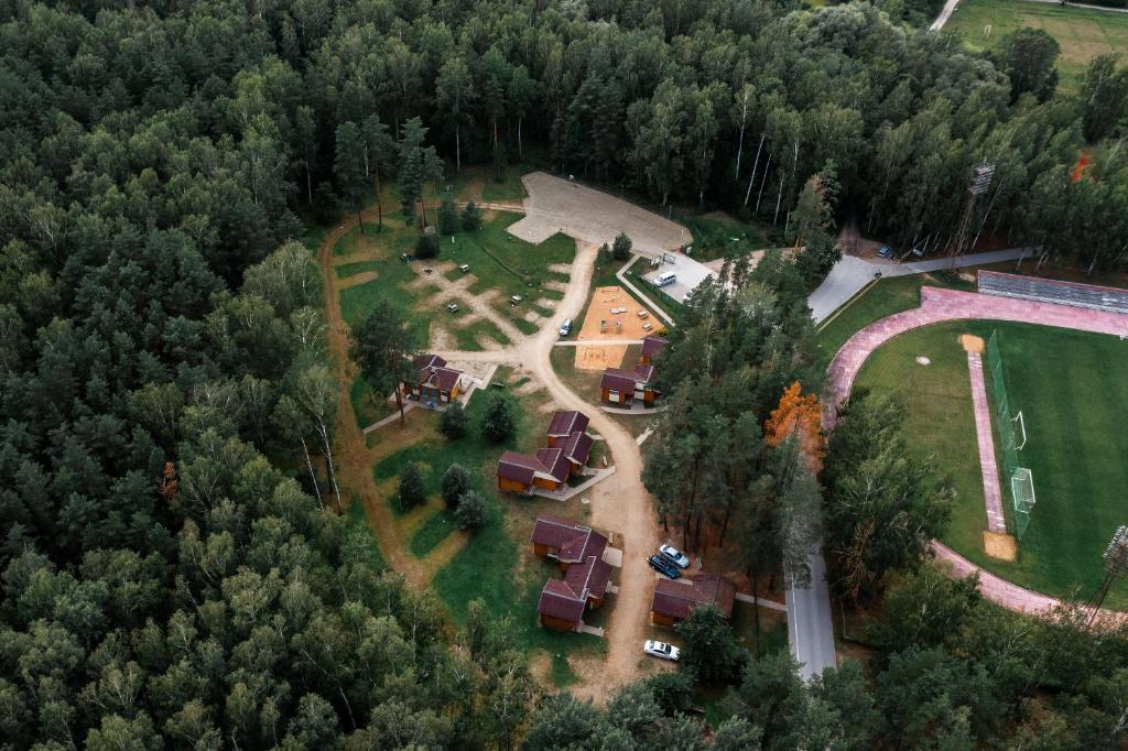 an aerial view of a house with trees at Camping & Camper place Pasvalys in Pasvalys