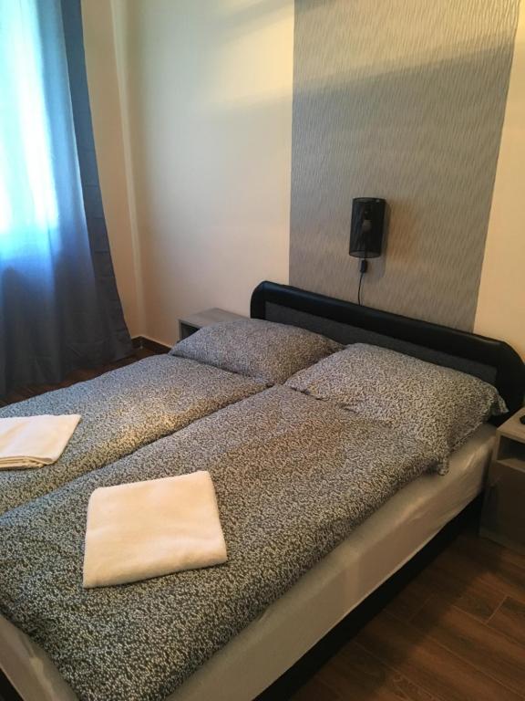 Posteľ alebo postele v izbe v ubytovaní Stella Apartman