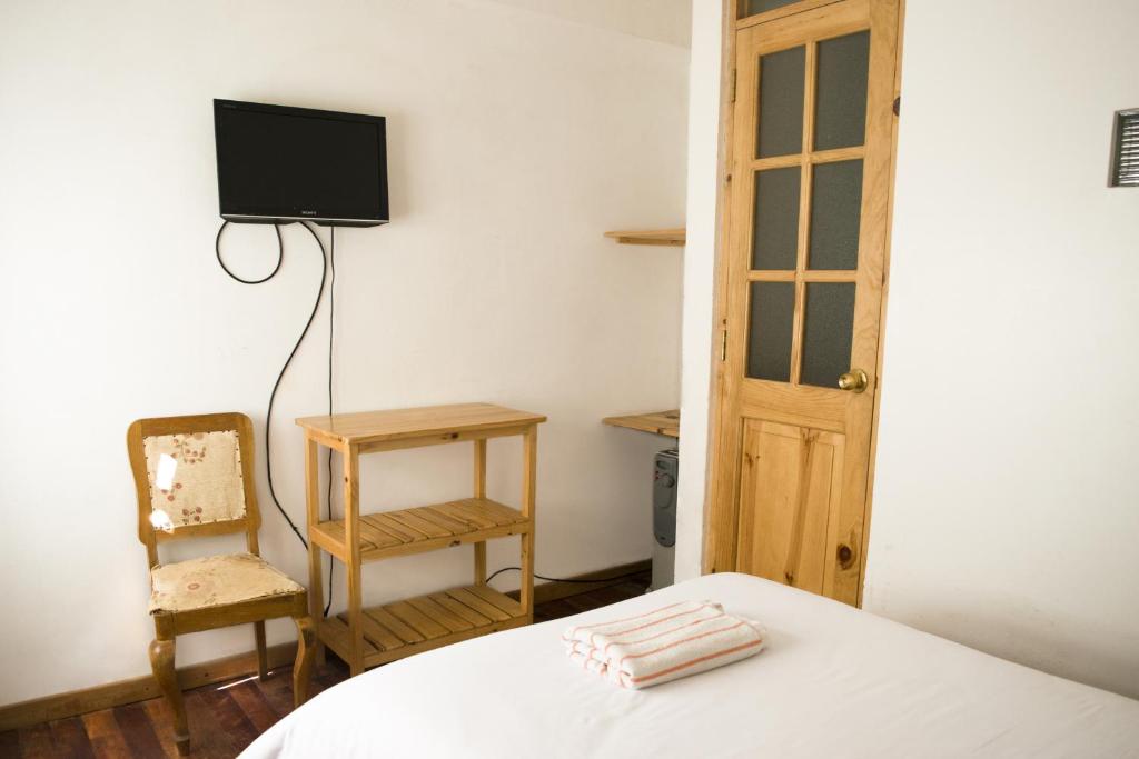 Postel nebo postele na pokoji v ubytování Casa Don Jose B & B