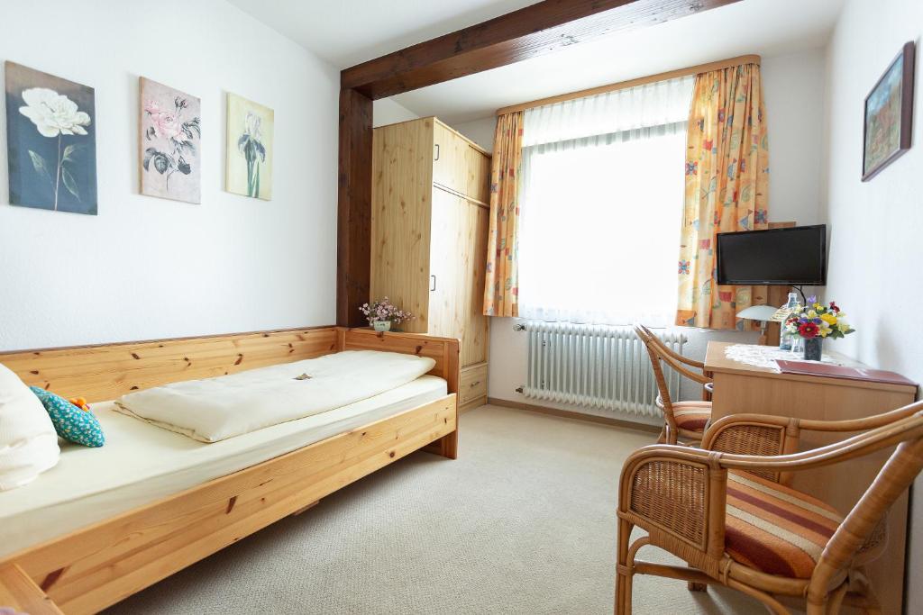 Postel nebo postele na pokoji v ubytování Hotel Silberdistel