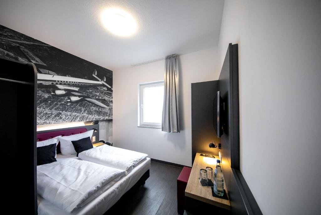 SMARTY Airport Cologne Hotel - KONTAKTLOSER SELF CHECK-IN - Resim 21