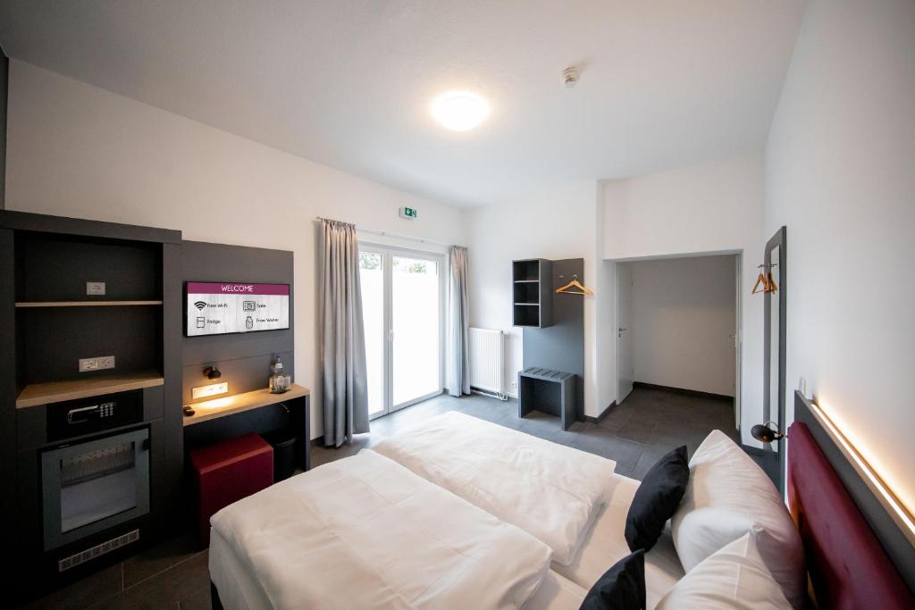 SMARTY Airport Cologne Hotel - KONTAKTLOSER SELF CHECK-IN - Resim 7