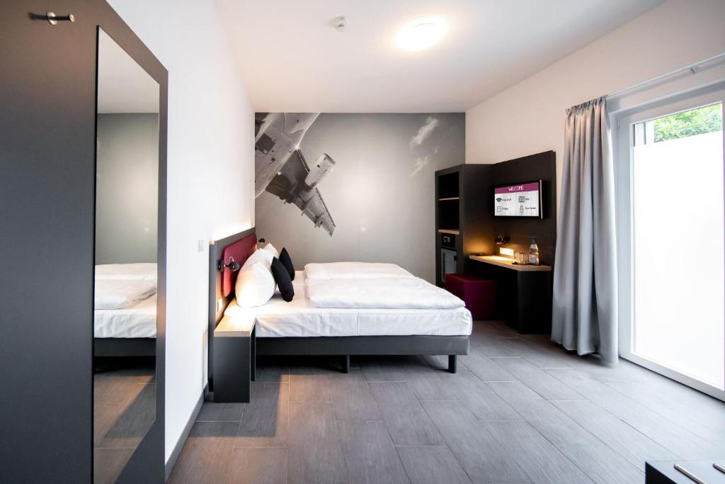 SMARTY Airport Cologne Hotel - KONTAKTLOSER SELF CHECK-IN - Resim 14