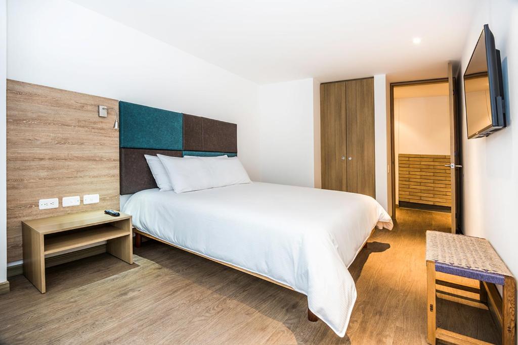 Postel nebo postele na pokoji v ubytování Hotel Viaggio Teleport City Suites