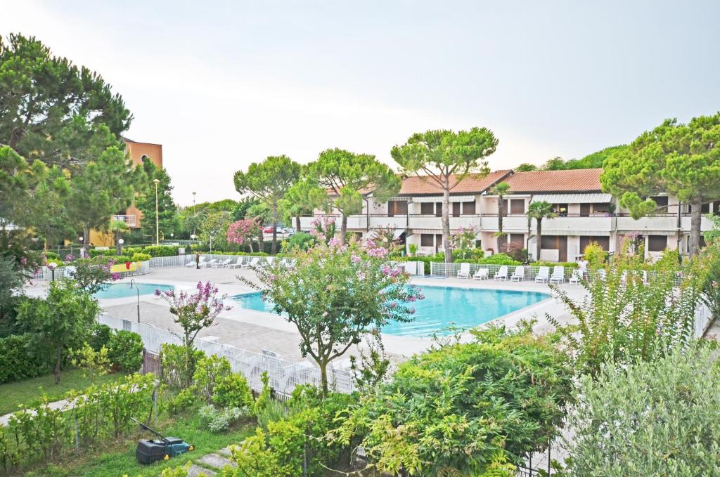 an image of a swimming pool at a resort at SABBIADORO in Cavallino-Treporti
