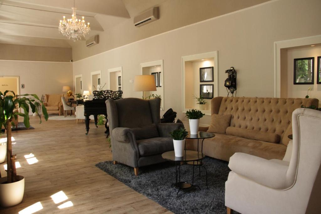 Posezení v ubytování Unitas Hotel