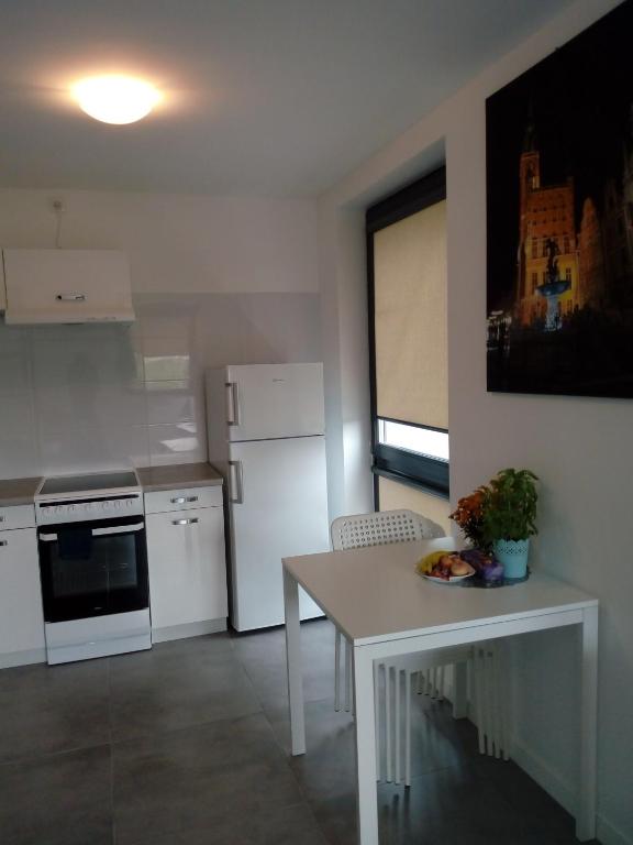 Kuchyňa alebo kuchynka v ubytovaní Villa Centrum