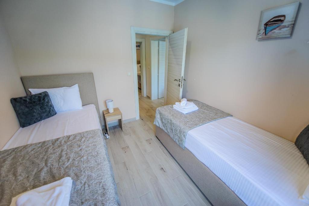 Postel nebo postele na pokoji v ubytování Apartment Vrutak