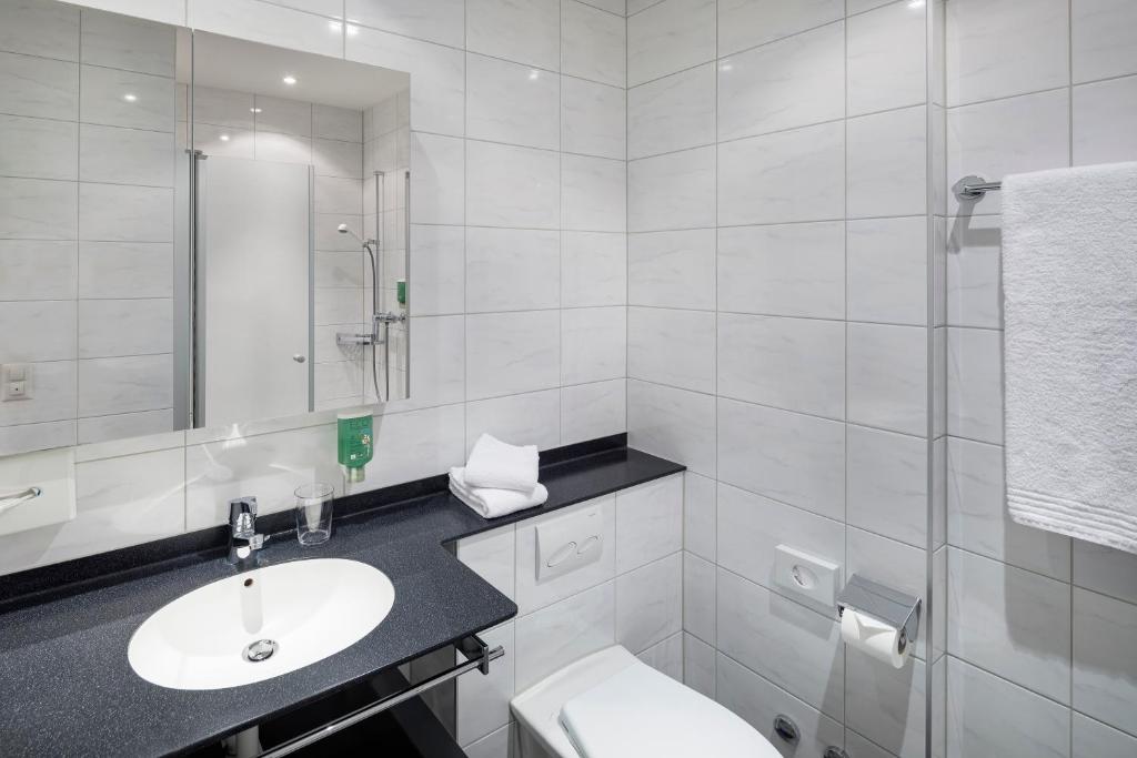 Koupelna v ubytování Hotel Stalden