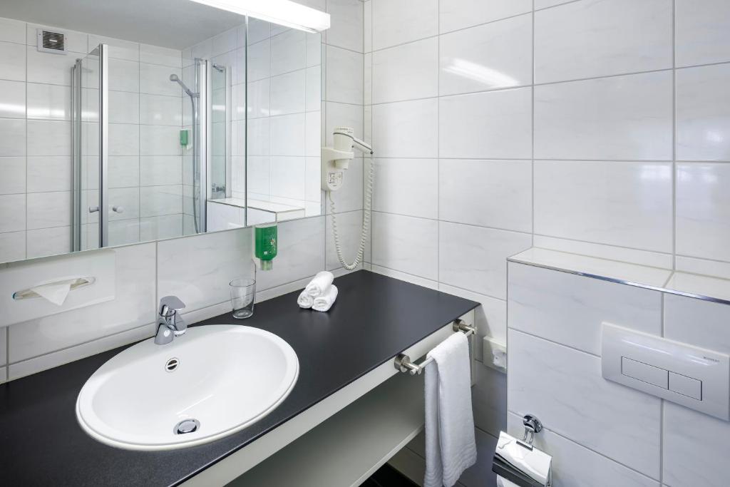 Koupelna v ubytování Hotel Stalden