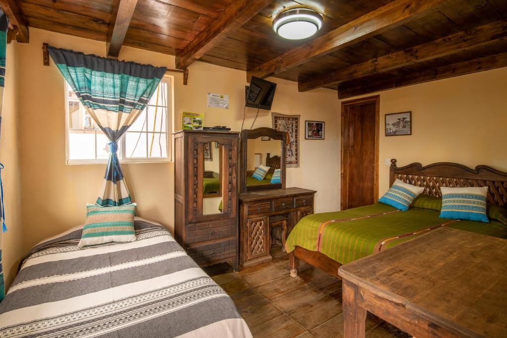 Postel nebo postele na pokoji v ubytování MYKONOS - Adult Hotel