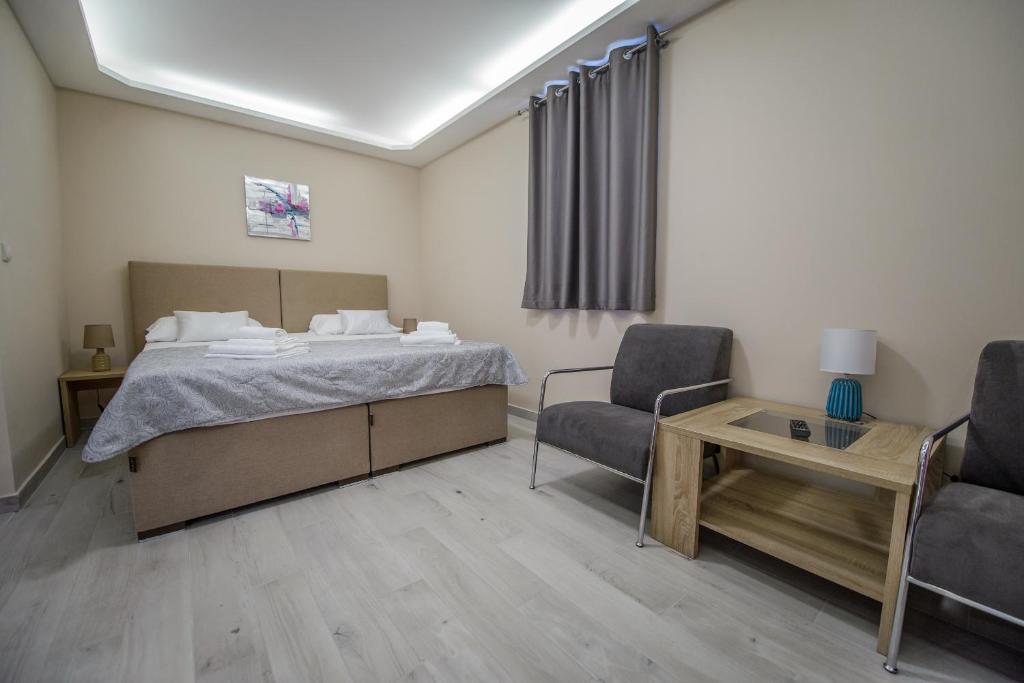 Postel nebo postele na pokoji v ubytování Apartment Vrutak