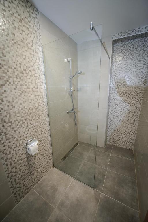 Koupelna v ubytování Apartment Vrutak