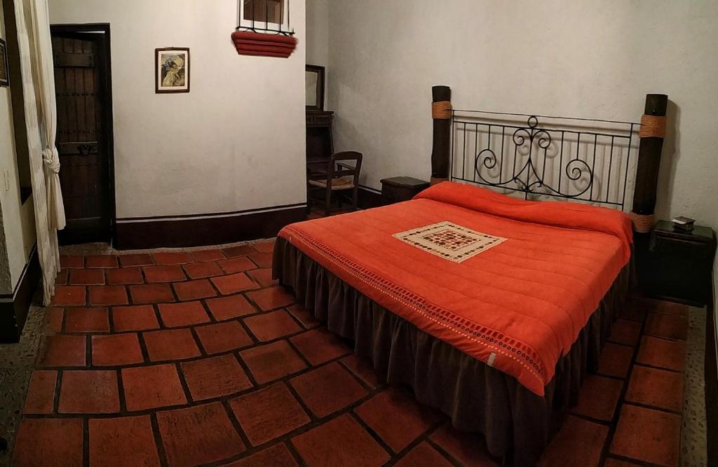 Postel nebo postele na pokoji v ubytování La Casona De La Esmeralda