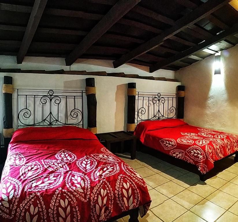 Postel nebo postele na pokoji v ubytování La Casona De La Esmeralda