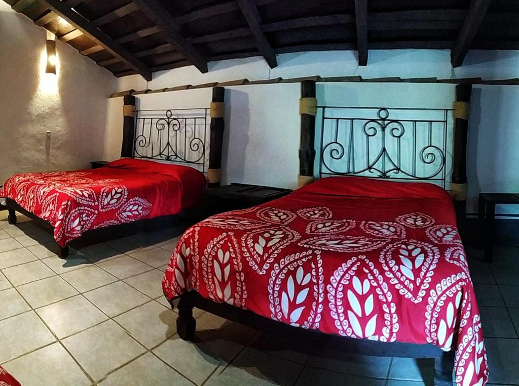 Postel nebo postele na pokoji v ubytování La Casona De La Esmeralda