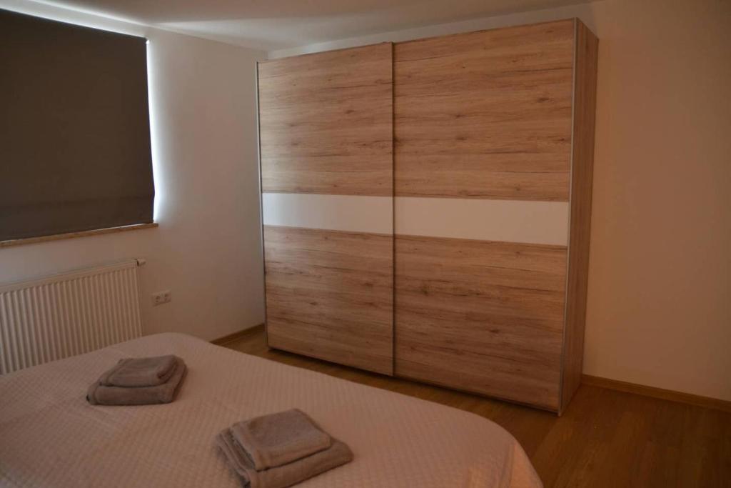 Postel nebo postele na pokoji v ubytování Apartmaji Gaby