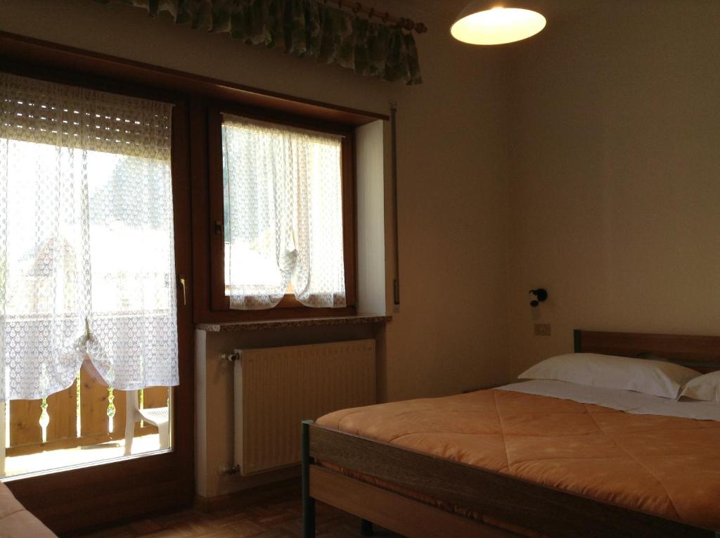 Postel nebo postele na pokoji v ubytování Verda Val