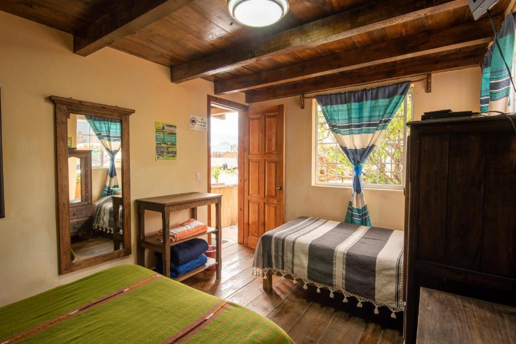 Postel nebo postele na pokoji v ubytování MYKONOS - Adult Hotel
