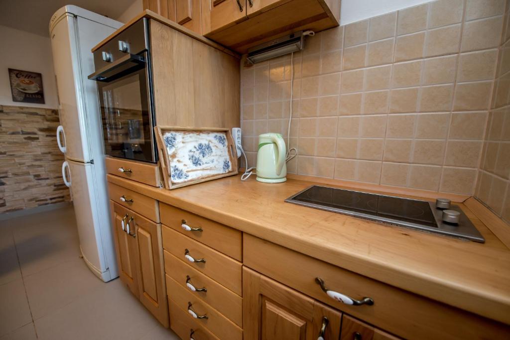 Kuchyň nebo kuchyňský kout v ubytování Mediteraneo Villa
