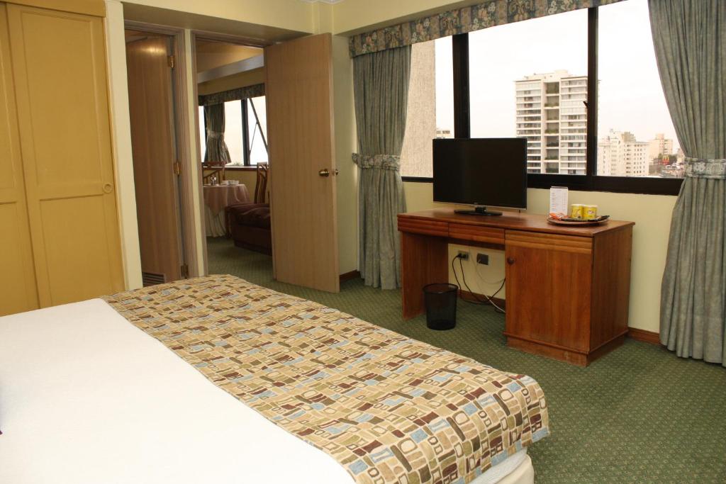 TV a/nebo společenská místnost v ubytování Gala Hotel