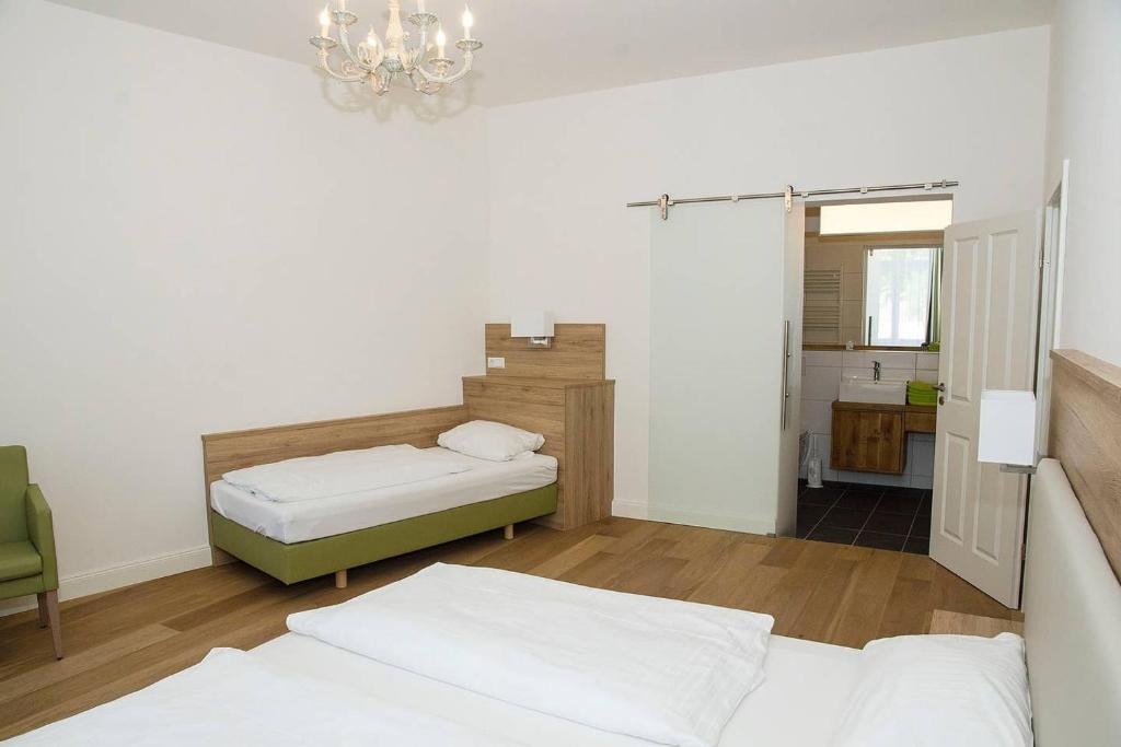 Postel nebo postele na pokoji v ubytování Perkeo Apartments