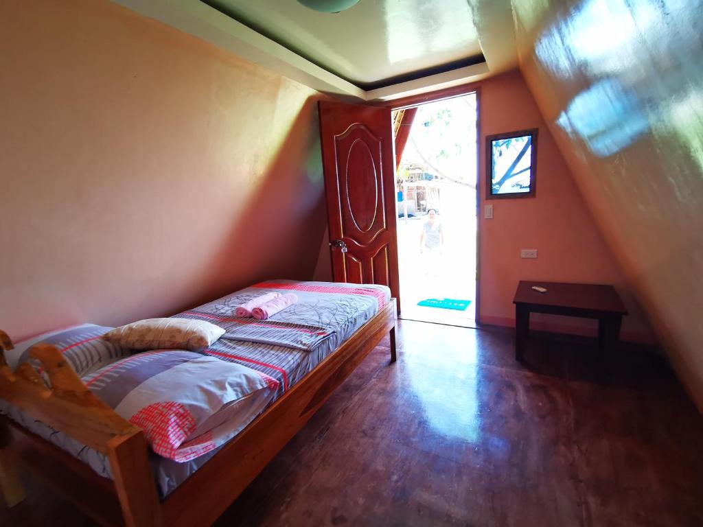 Postel nebo postele na pokoji v ubytování Acuario Beach Inn