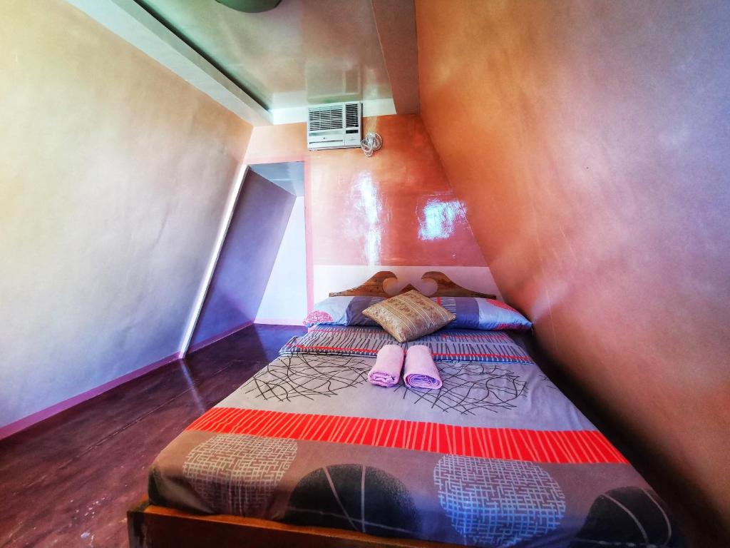 Postel nebo postele na pokoji v ubytování Acuario Beach Inn