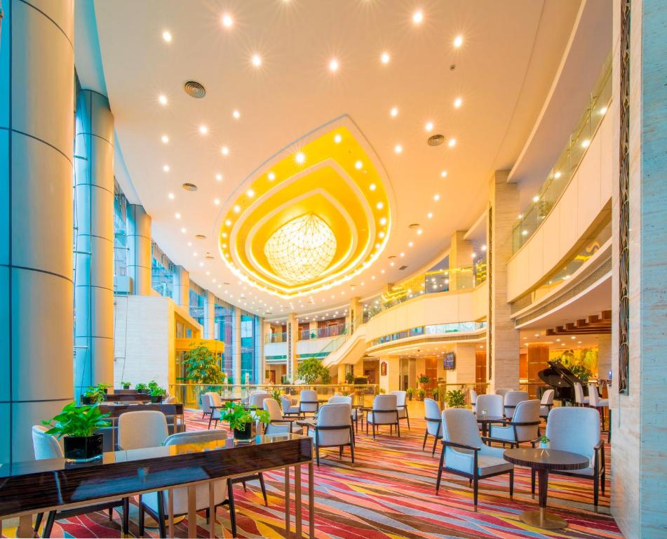 Posezení v ubytování Jin Jiang Pine City Hotel