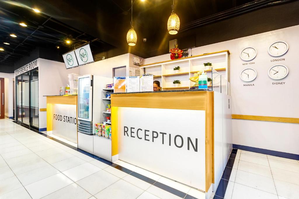 El vestíbulo o zona de recepción de Nomad's Hub - Best Value Co-living Hostel