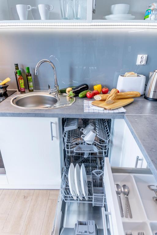 Kuchyň nebo kuchyňský kout v ubytování Apartament Jaskółcza 30