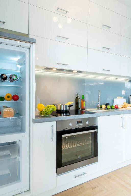 Kuchyň nebo kuchyňský kout v ubytování Apartament Jaskółcza 30