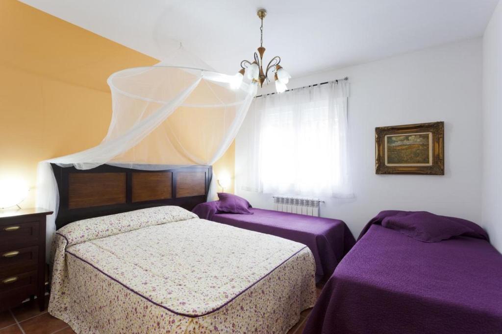 Posteľ alebo postele v izbe v ubytovaní Tiara Vacaciones