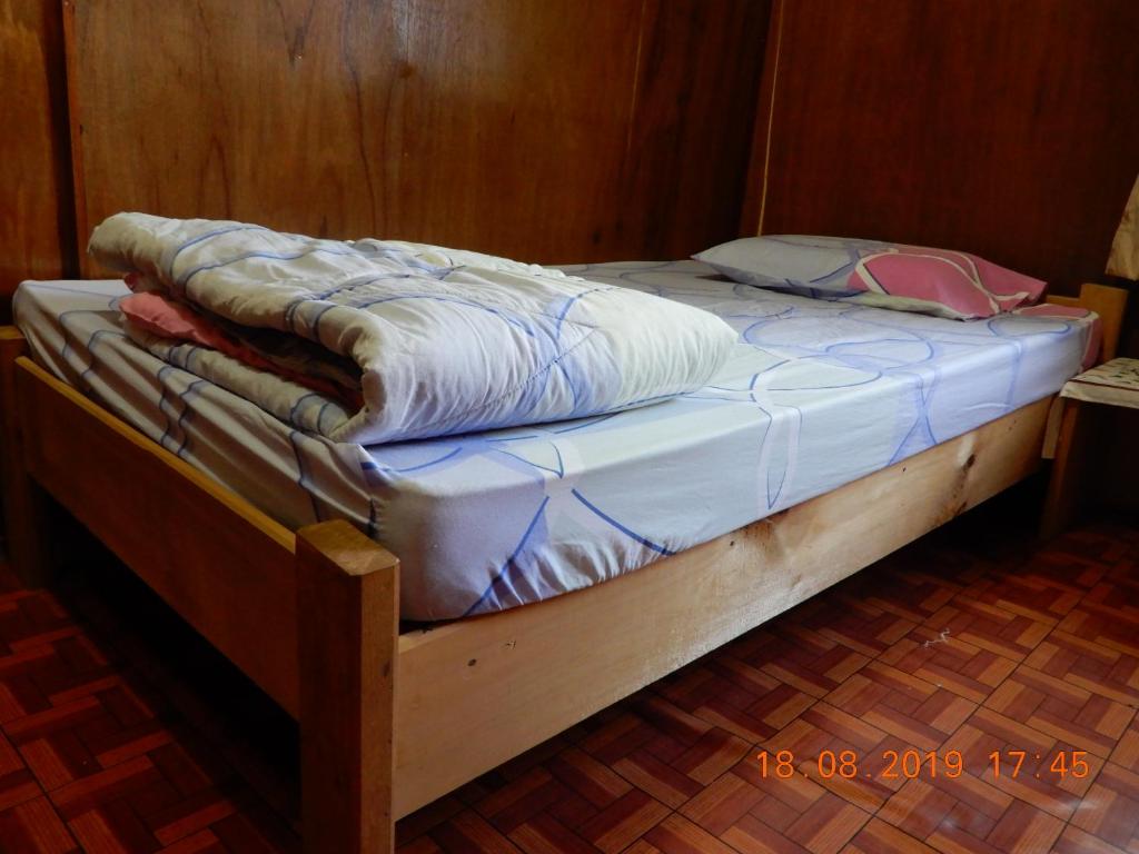 Postel nebo postele na pokoji v ubytování Bulan And Daud Homestay
