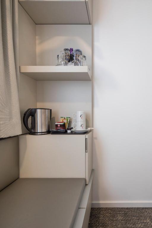Kuchyň nebo kuchyňský kout v ubytování Stadthotel Münster
