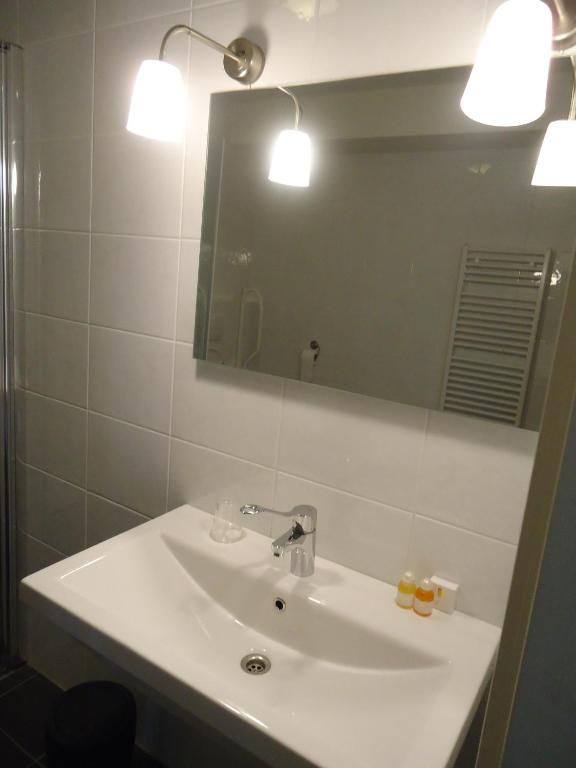 Koupelna v ubytování Hotel en Restaurant de Stripe